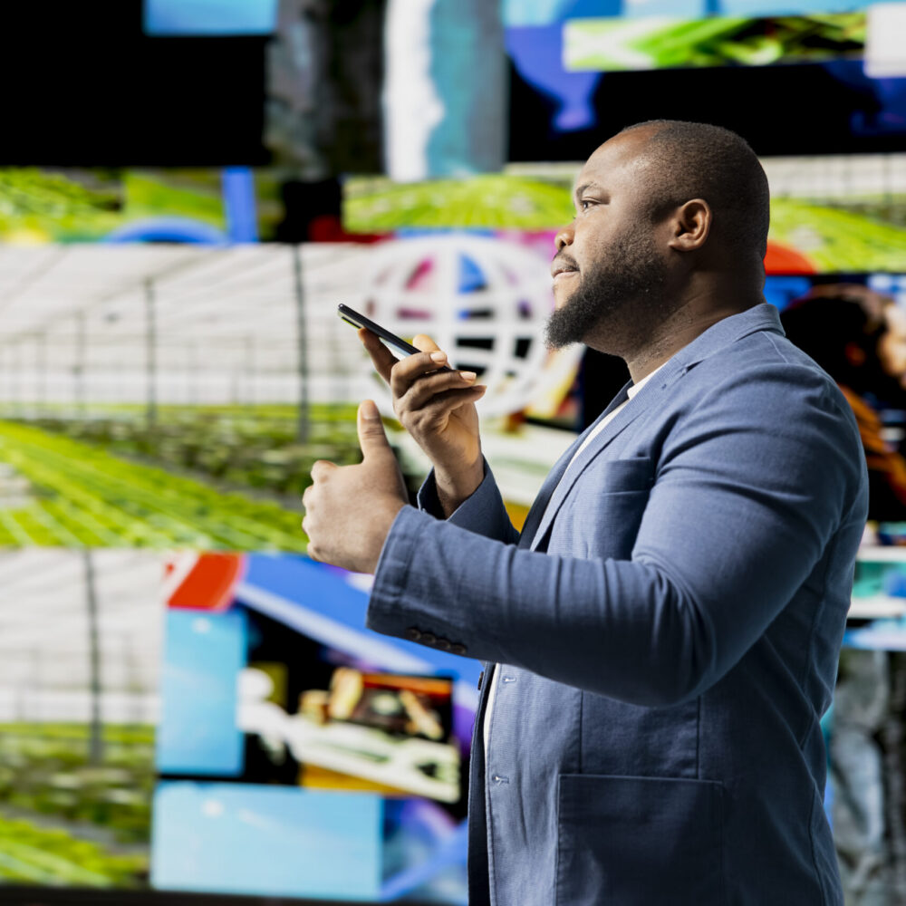 African american person uses a phone call connection to showcase engagement and online communication through mobile high tech platforms. Online interaction through social networks apps.